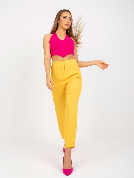 Žlté elegantné látkové nohavice pre ženy so zipsom