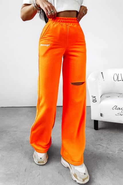 Ola Voga dámske tepláky s vysokým elastickým pásom a roztrhaným efektom v oranžovej farbe